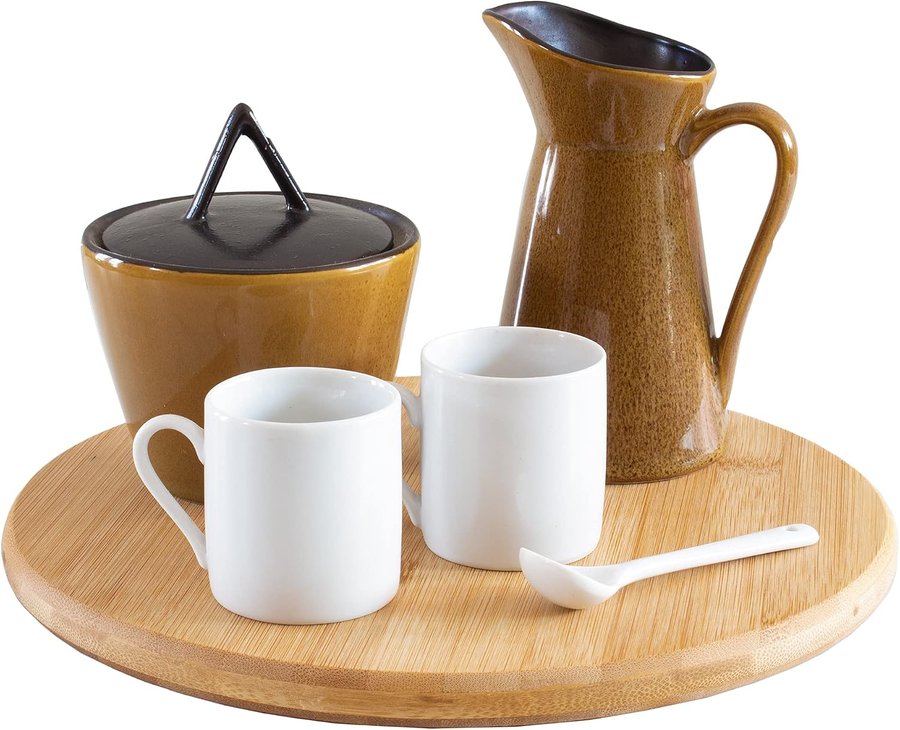 Round 10-inch bamboo lazy susan turntable with mugs and a pitcher
