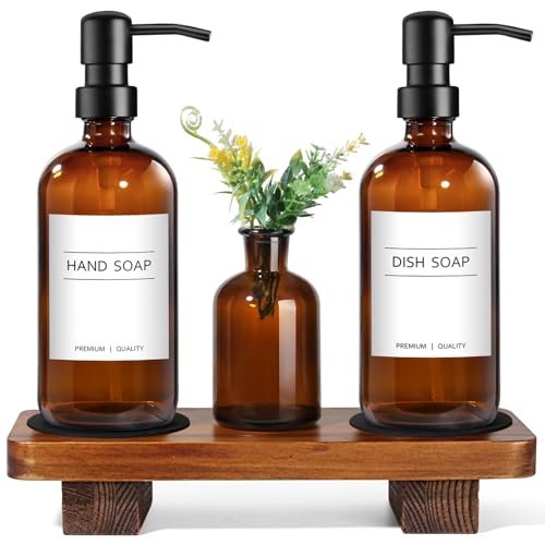 Amber glass soap dispenser set with black pumps and wood riser tray
